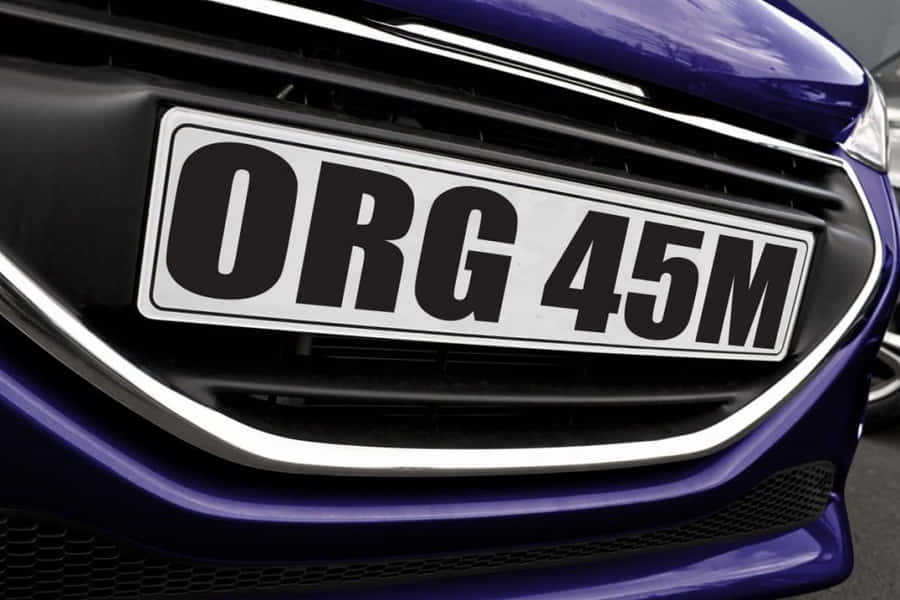 Personalized Vehicle License Plate On The Rear Of A Car Wallpaper