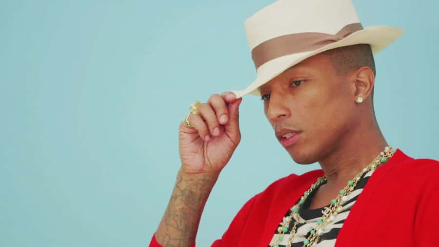 Pharrell Williams Stylish Hat Pose Wallpaper