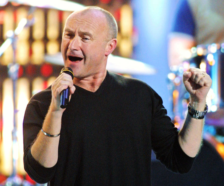 Phil Collins Singing High Notes Wallpaper