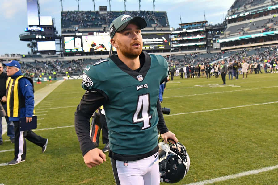 Philadelphia Eagles Player Number4 Walkingon Field Wallpaper