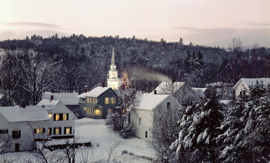 Picturesque Snowy Village In Winter Wallpaper