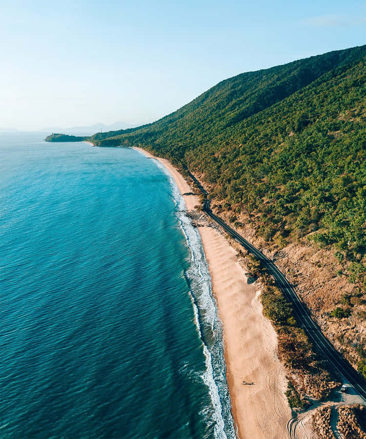 Picturesque Sunset At Cairns Beach, Australia Wallpaper