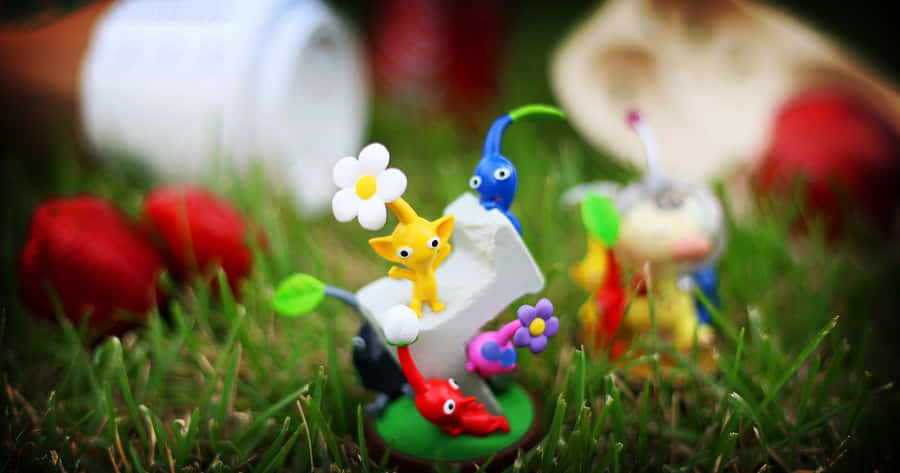 Pikmin_ Figurines_ In_ Garden.jpg Wallpaper