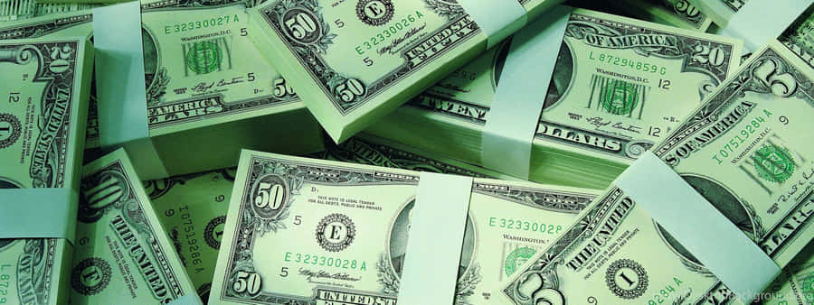 Pilesof U S Currency Bands Wallpaper