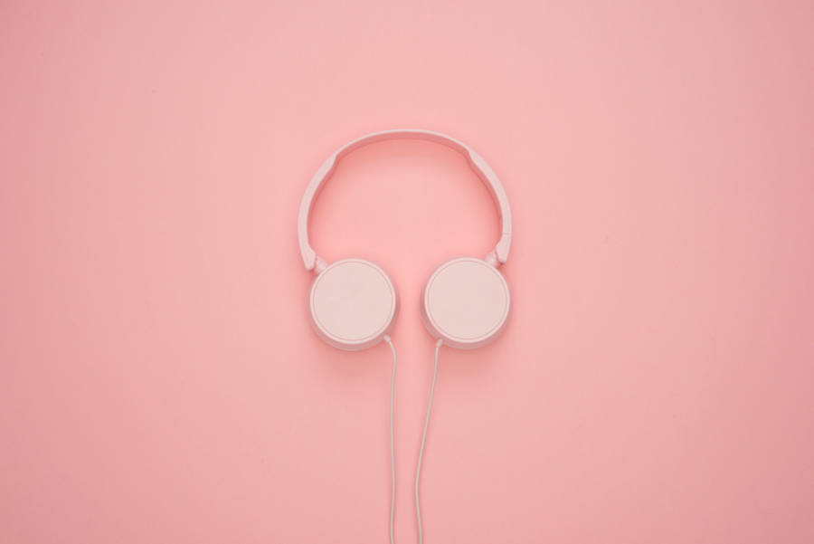 Pink Headphone In Plain Color Wallpaper