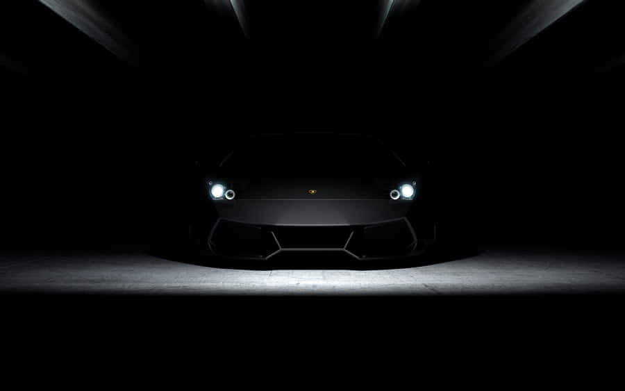 Plain Black Desktop With A Car Wallpaper