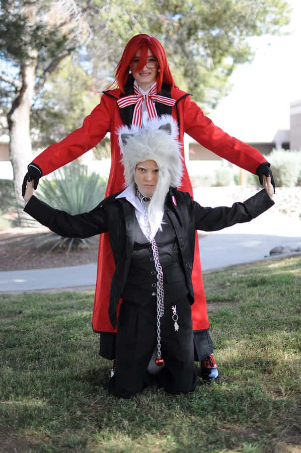 Pluto From Black Butler Showcasing His Fiery Skillset Wallpaper