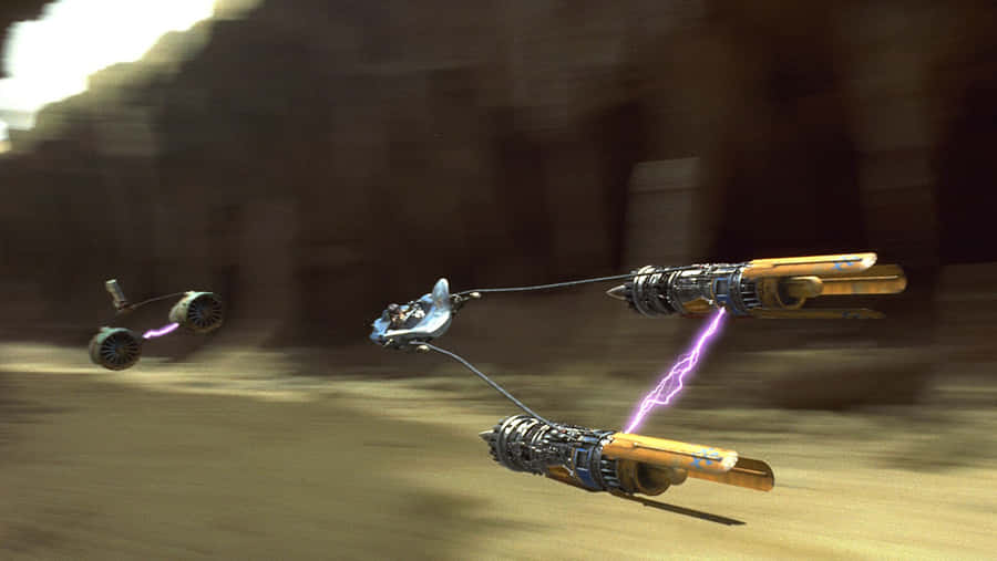 Podracers Speeding Through A Desert Course Wallpaper
