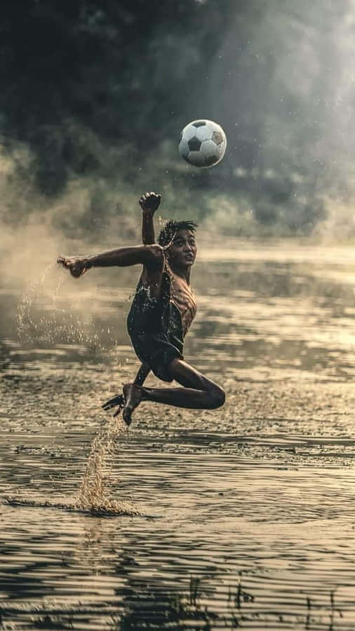 Poor Kid Playing Soccer Wallpaper