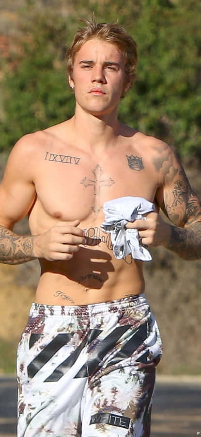 Pop Sensation Justin Bieber Takes The World By Storm In 2021. Wallpaper