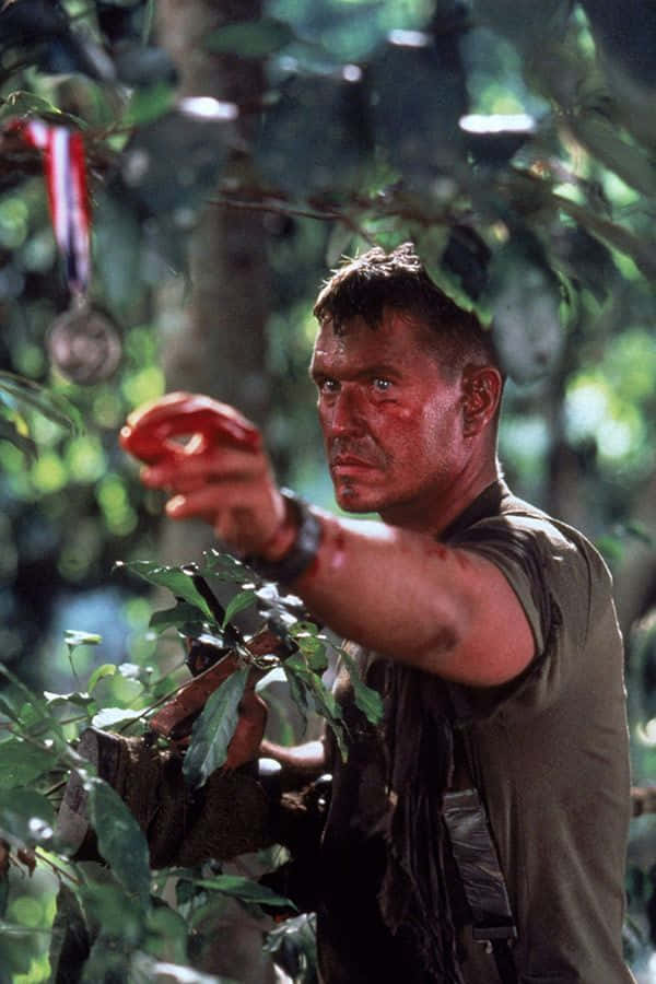 Portrait Of Tom Berenger In A Thoughtful Pose Wallpaper