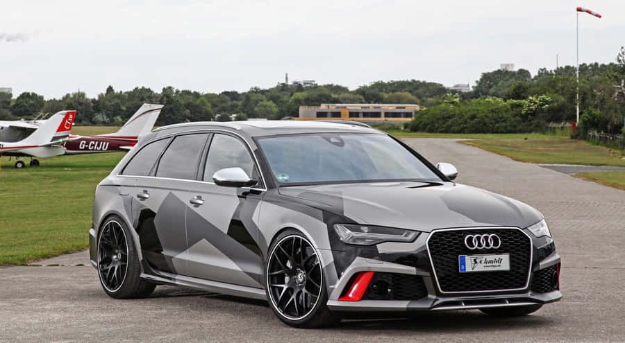 Powerful Audi Rs6 In Action Wallpaper