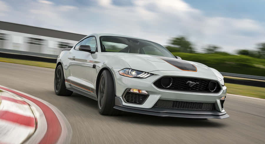 Powerful Ford Mustang Mach 1 On Open Road Wallpaper