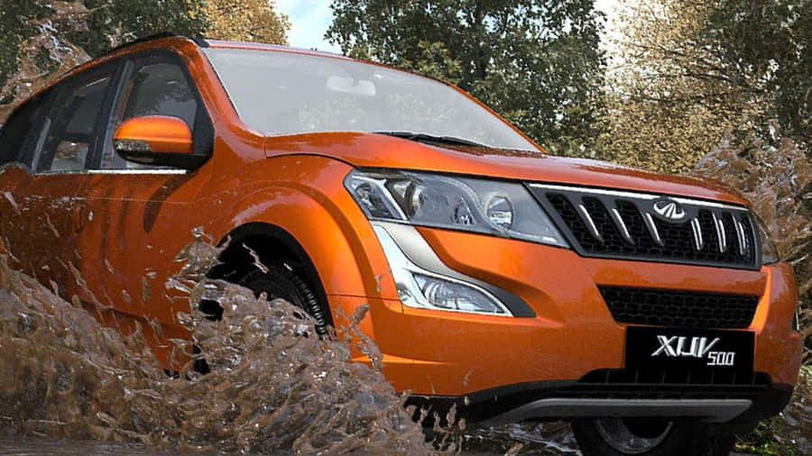 Powerful Mahindra Suv Against A Breathtaking Landscape Wallpaper