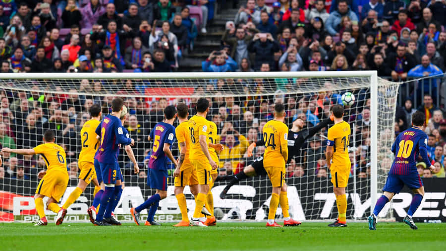 Precision In Motion: Lionel Messi's Unforgettable Free Kick Wallpaper