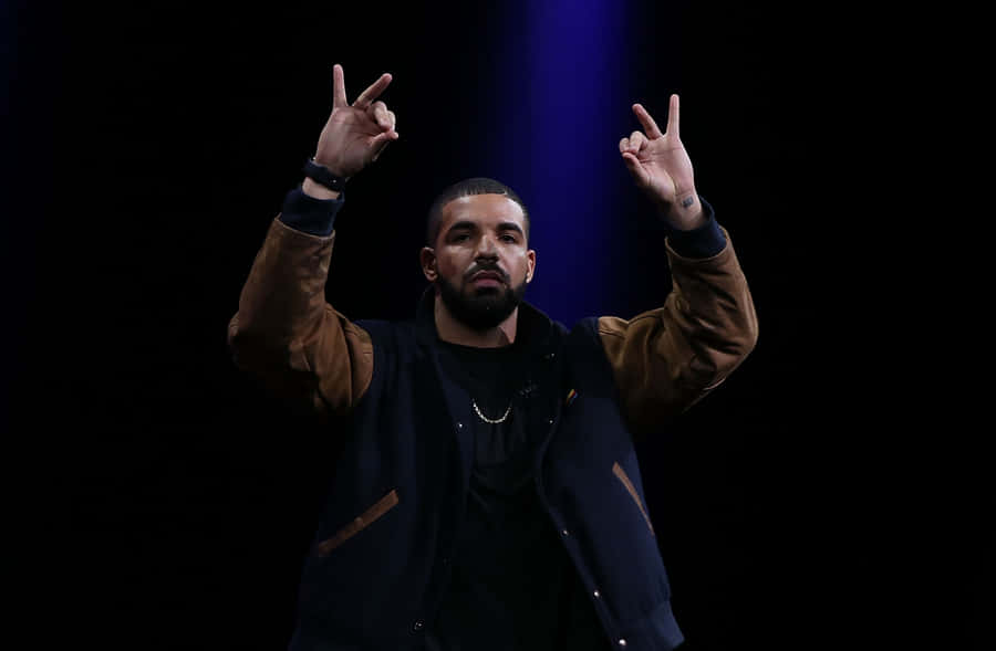 Preparing For A Productive Day With Drake Computer Wallpaper