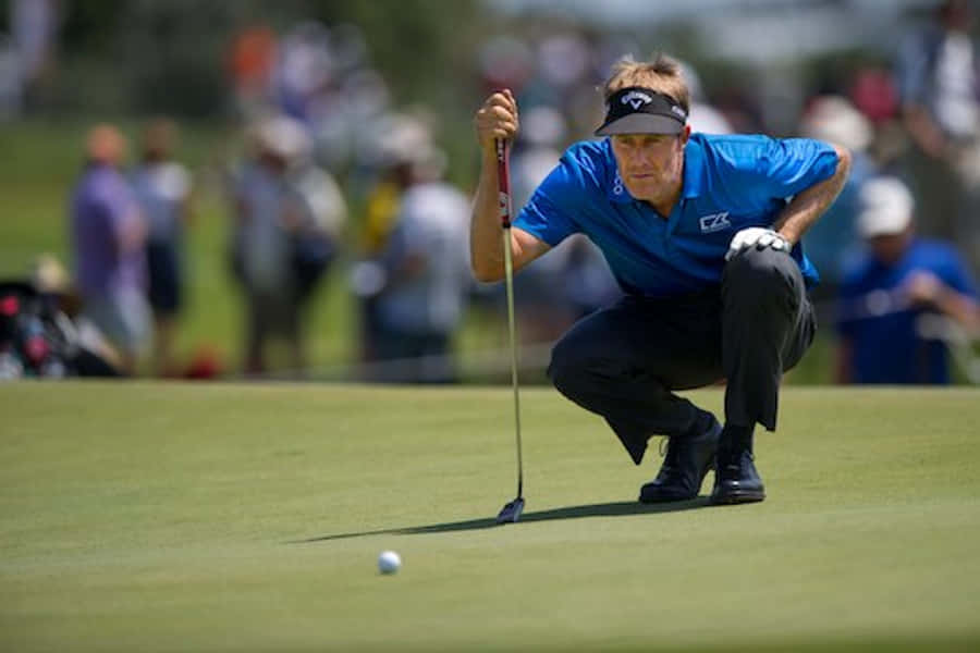 Professional Golfer Stuart Appleby Studying The Field Wallpaper