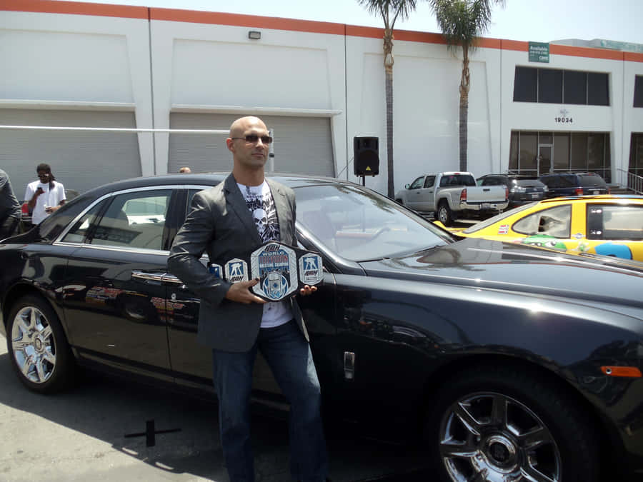 Professional Wrestler Christopher Daniels At K1 Speed Indoor Racing Event Wallpaper