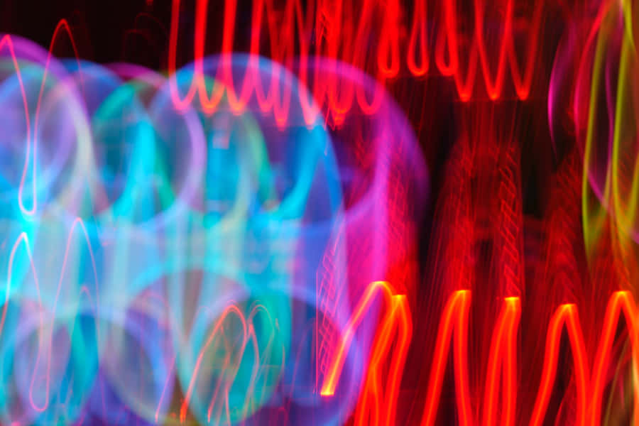 Psychedelic Neon Lights Illuminating The Night Wallpaper