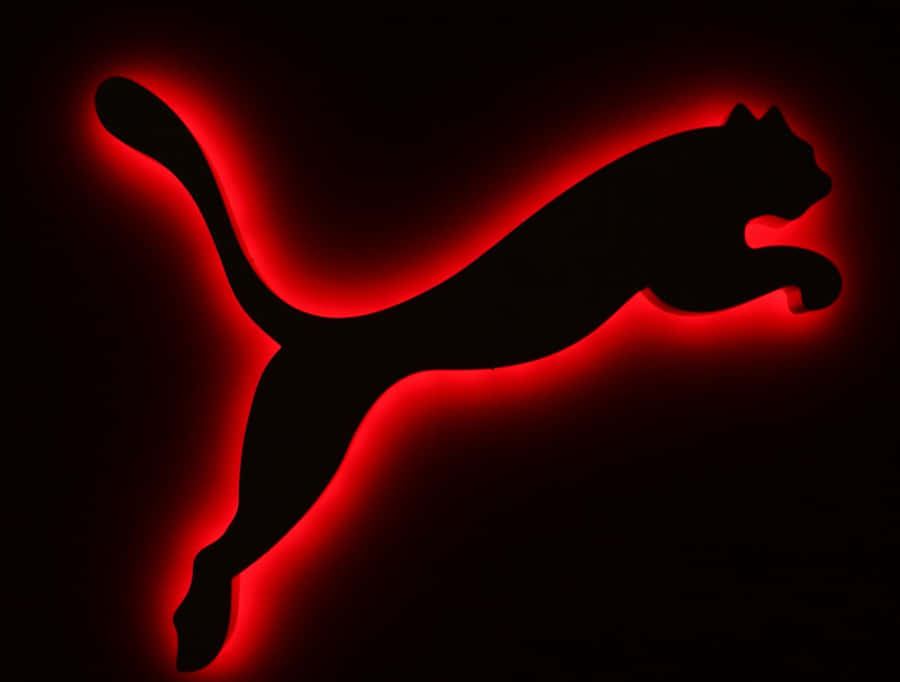 Puma Brand Logo In Vibrant Colors Wallpaper