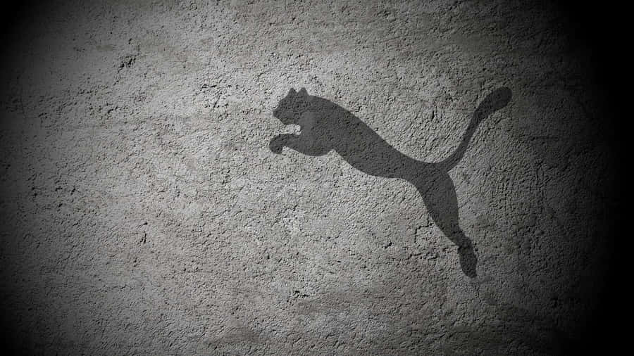 Puma Logo - Unleashing Speed & Precision Wallpaper