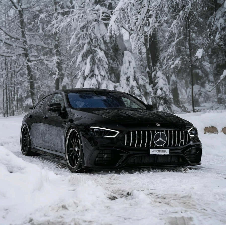 Quality Winter Tires On Snowy Road Wallpaper