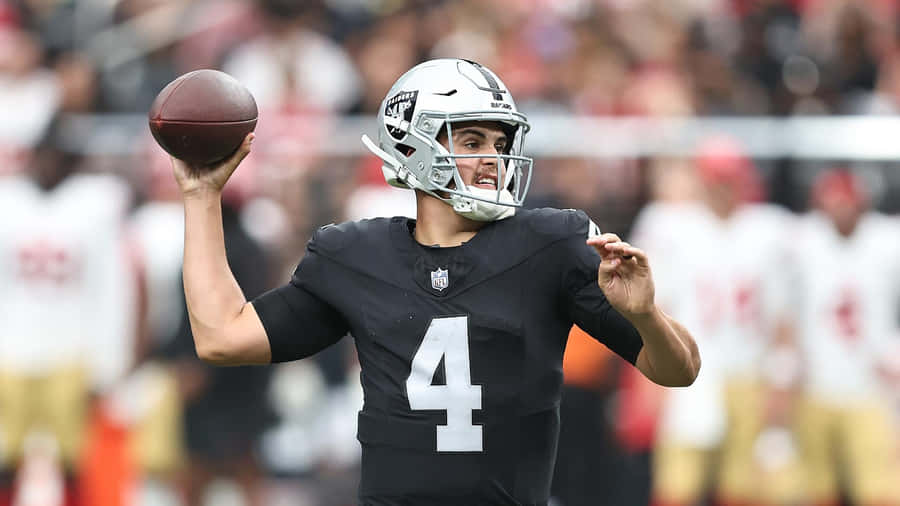 Quarterback Throwing Football Action Wallpaper