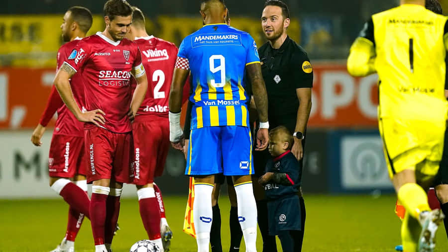 R K C Waalwijk Match Momentwith Child Mascot Wallpaper