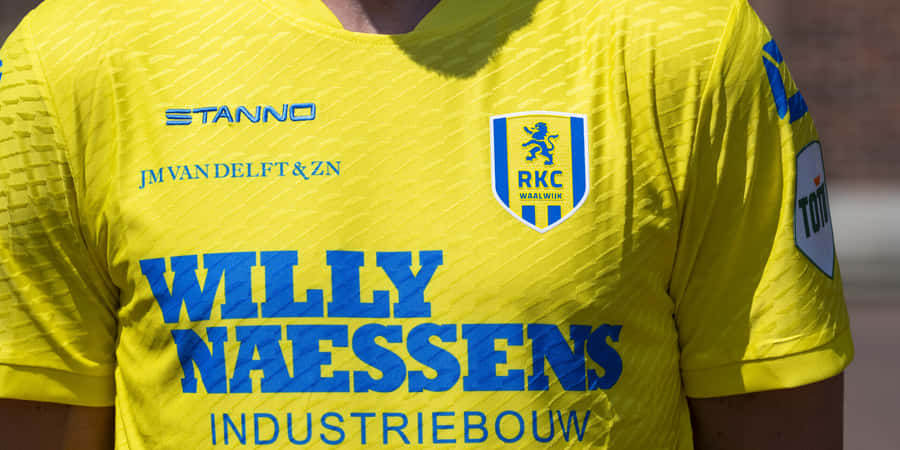 R K C Waalwijk Yellow Jersey Closeup Wallpaper