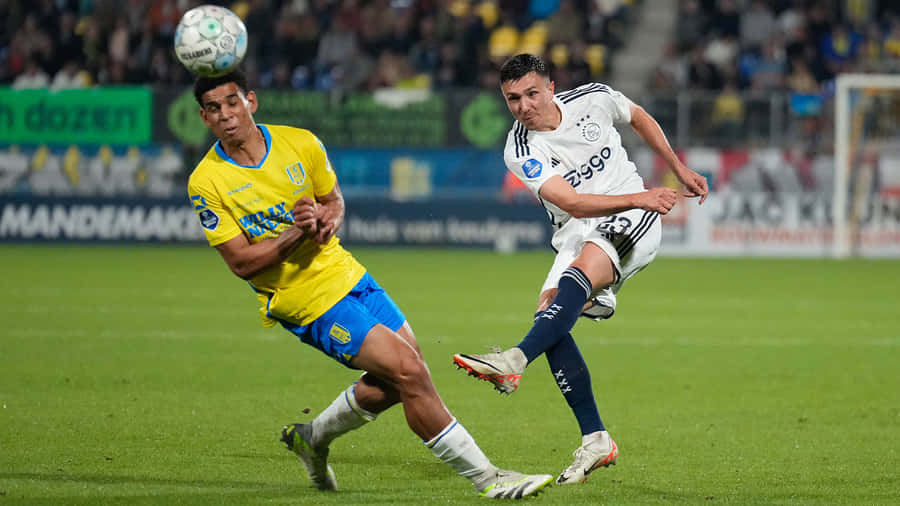 R K C Waalwijkvs Ajax Intense Match Moment Wallpaper