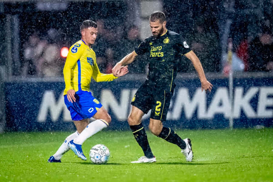 R K C Waalwijkvs Opponent Rainy Match Wallpaper