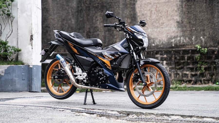 Raider 150 Fi Sporty Design Wallpaper