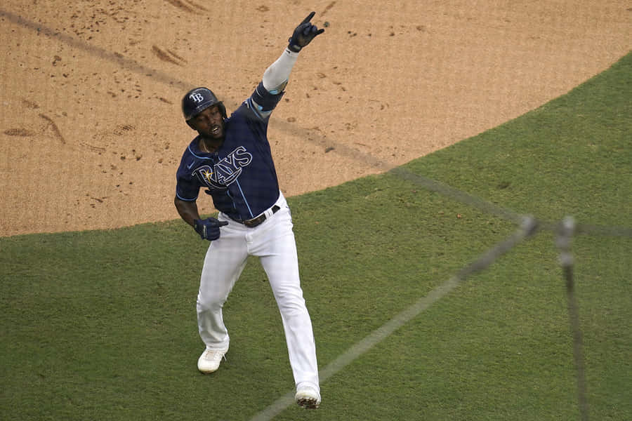 Randy Arozarena In Action During A Baseball Game. Wallpaper