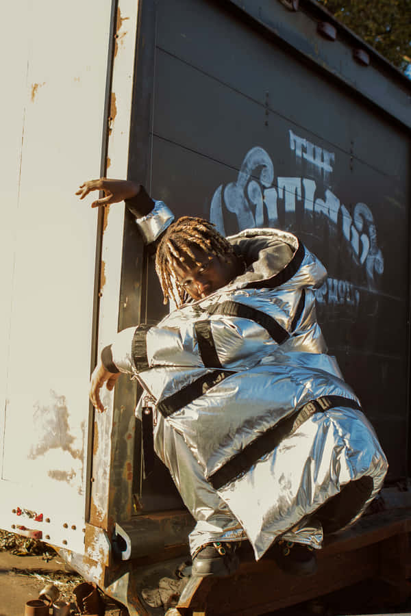 Rapper Don Toliver Smiling In A White Hat Wallpaper