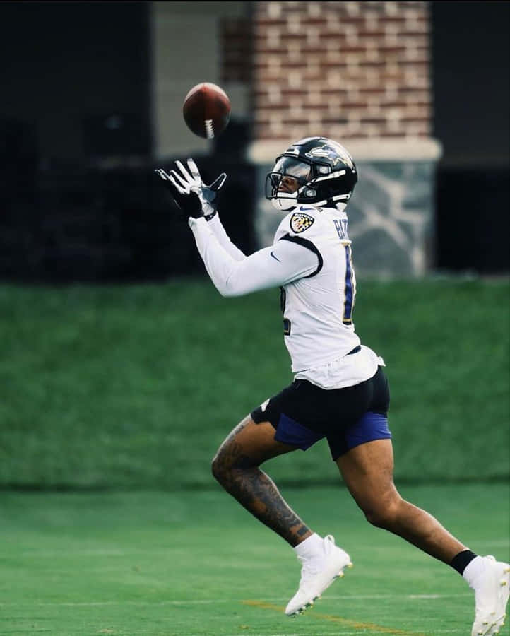 Rashod Bateman Catching Football Practice Wallpaper