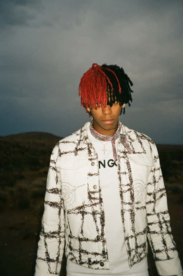 Red Black Haired Manin Desert Wallpaper