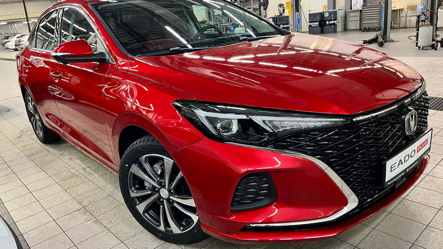 Red Changan Eado Sedan Showroom Wallpaper