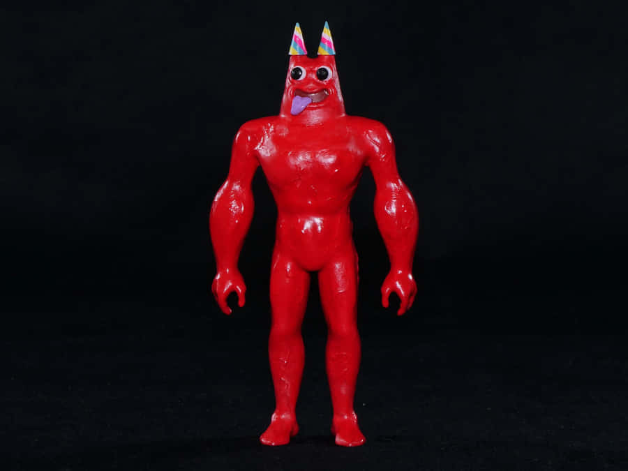 Red Figurewith Party Hat Wallpaper