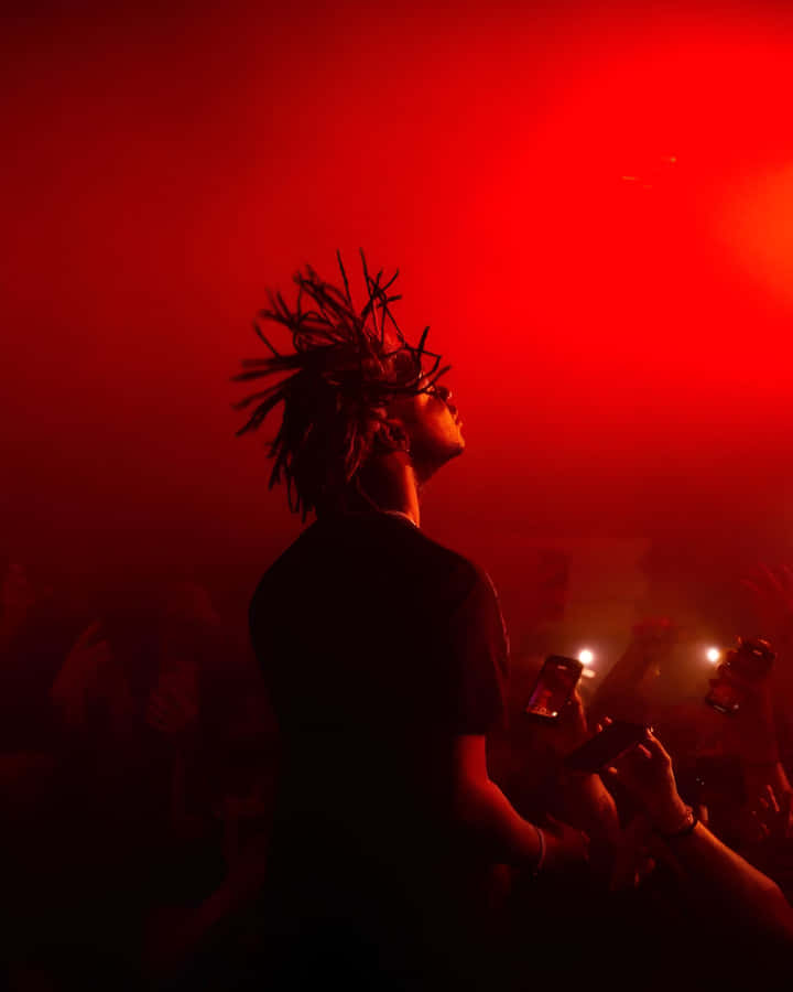 Red Hued Concert Silhouette Wallpaper