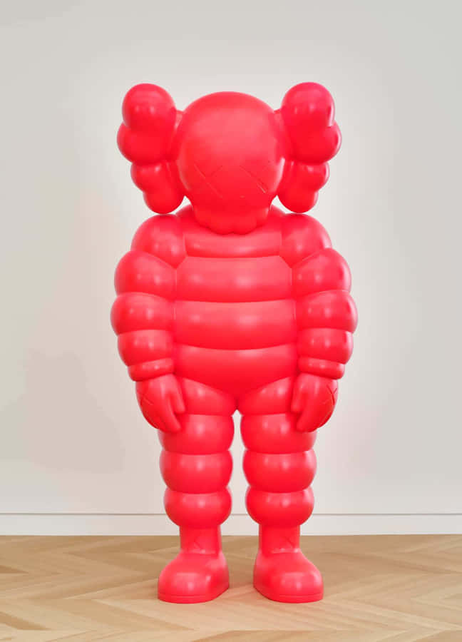 Red Kaws Balloon Figure Sculpture Wallpaper