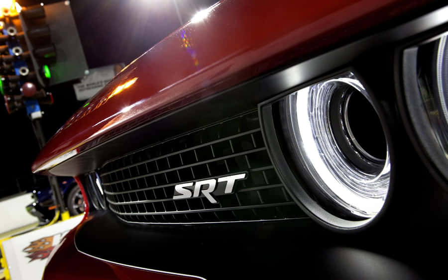 Red S R T Vehicle Grilleand Headlight Wallpaper