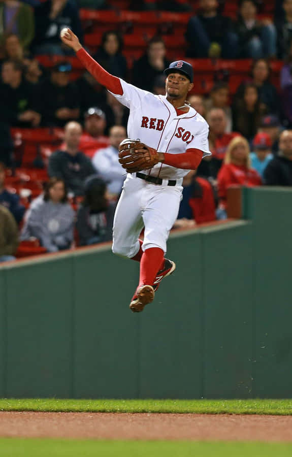 Red Sox Player Mid Air Throw Wallpaper