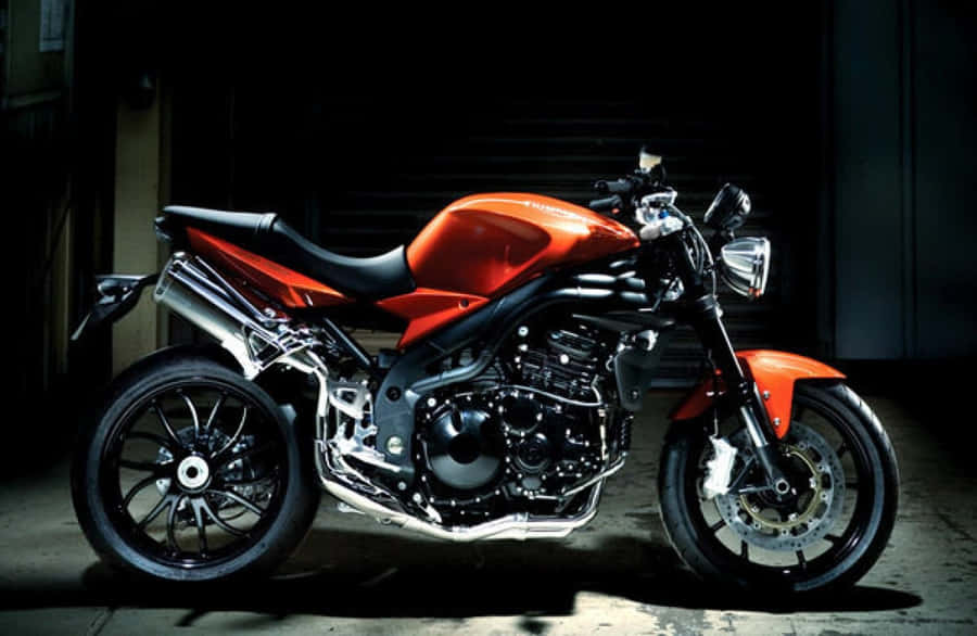 Red Sport Motorcyclein Dark Garage Wallpaper