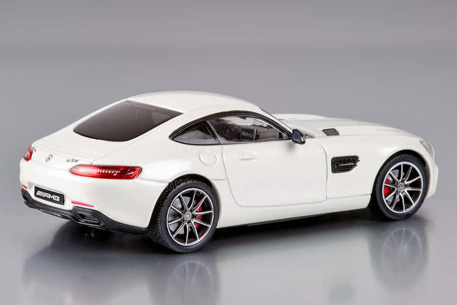 Red Sports Car In Action Wallpaper