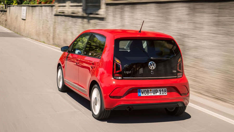 Red Volkswagen Up Motion Wallpaper
