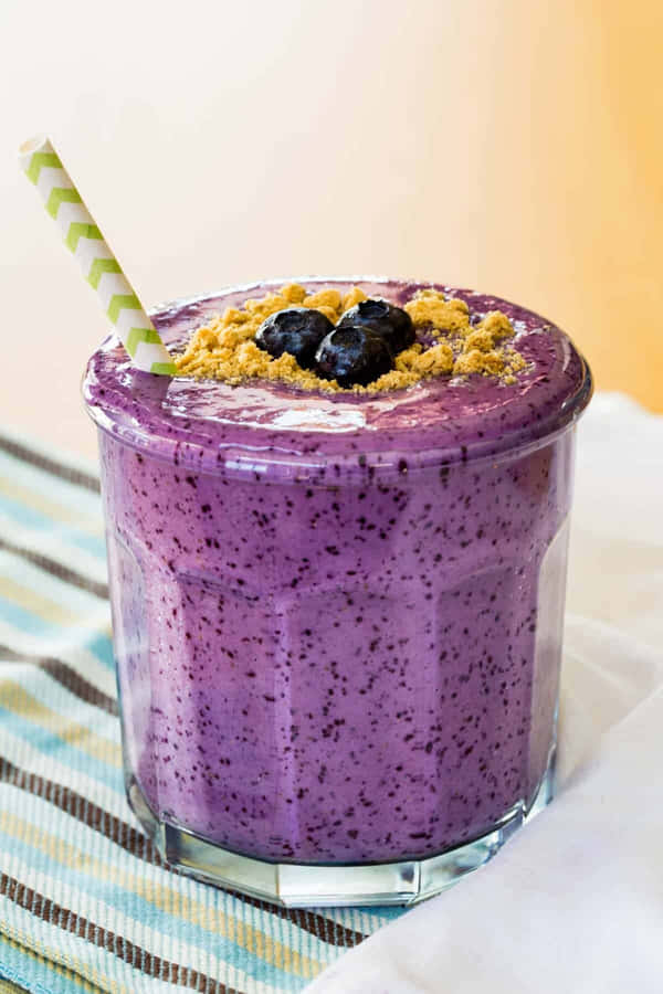 Refreshing Blueberry Smoothie On A Sunny Day Wallpaper
