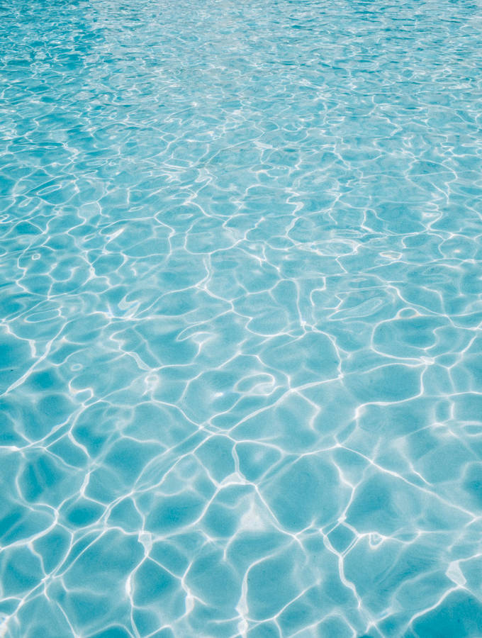 Refreshing Glare Of Pool Water Wallpaper