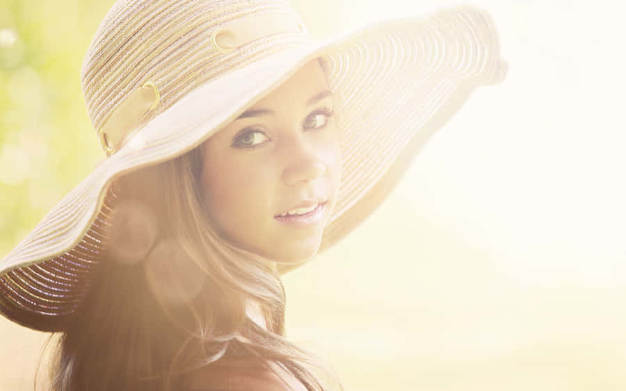 Relaxing Beach Day With A Stylish Hat Wallpaper