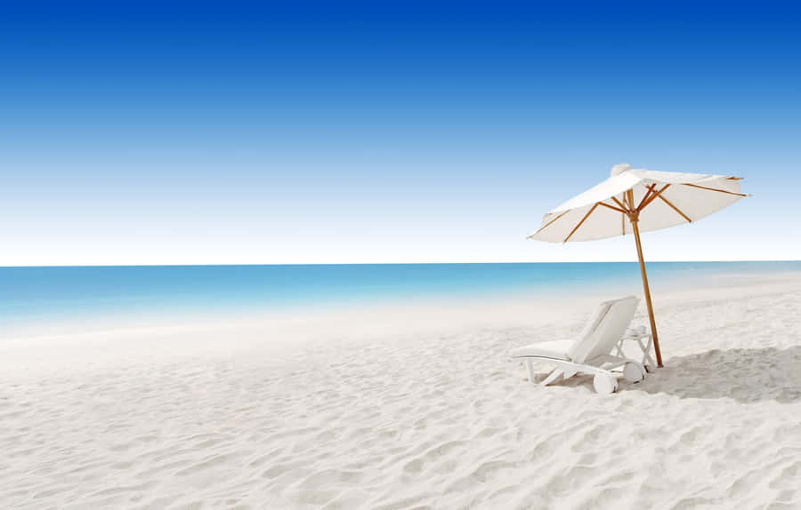 Relaxing Beach Sunbed Wallpaper