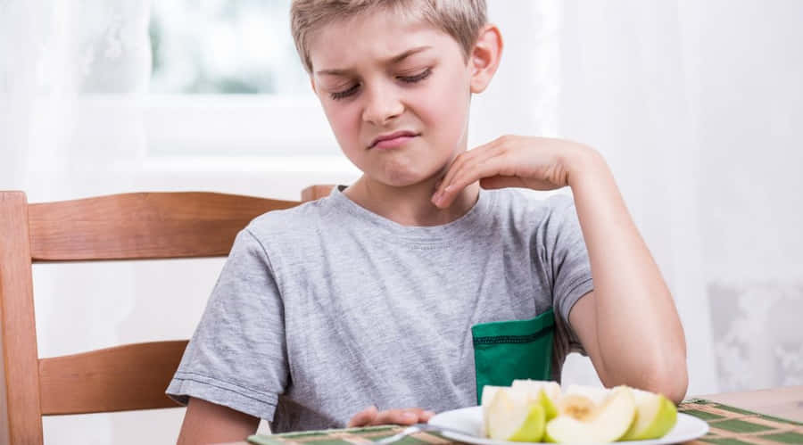 Reluctant Boy And Apples Wallpaper